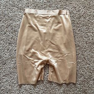 Barely there low back short. New with tags! Size S, color is Clay.